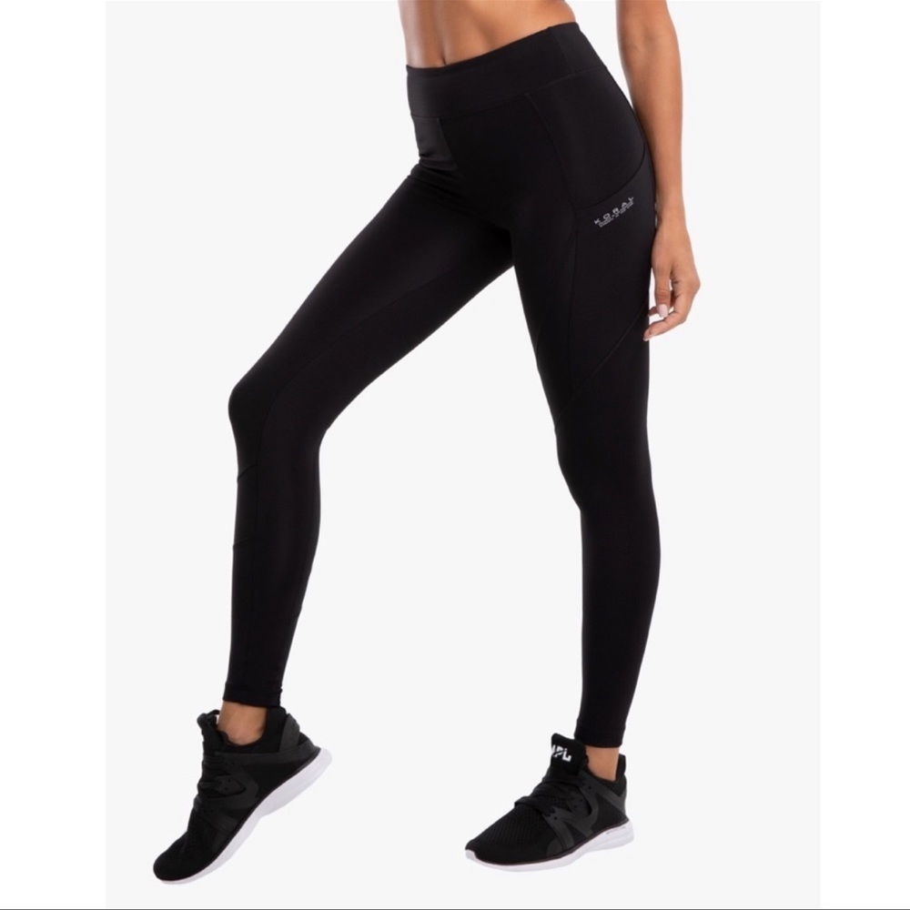 Koral High- Rise Blackout Leggings in a Size Small.